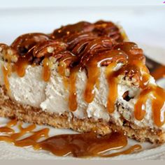 a piece of cheesecake with caramel drizzle on top