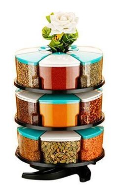 three tiered spice rack with flowers on top