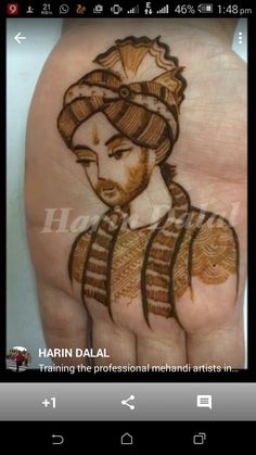 a hand with henna on it and an image of a woman's face