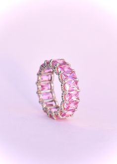 Pink Sapphire Eternity, Pink Eternity Ring, Gift Idea, Birthstone Ring, Stacking Sapphire Eternity, Eternity Band, Gift For Her 1. Product Details ✧ Material : High Quality Solid 925 Sterling Silver ✧ Color Options: 14K Gold, 14K White Gold ✧ Stone Type: Simulated Pink Sapphire 2. Shipping & Packaging Details ☐ Dispatches in 4 - 8 business days ☑ Multiple shipping speeds available 3. Custom Orders Its simple, just get in touch with us and we'll take care of the rest. 4. Returns * We offer a Retu Pink Sapphire Wedding Band, Sapphire Eternity Band, Pink Stone Rings, Sapphire Eternity Ring, Eternity Rings, Promise Ring Gift, Sapphire Band, Full Eternity Ring, Shipping Packaging