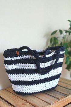 Stylish accessory for this dream summer vacation by the sea. Roomy enough to carry beach stuff, books, toiletry pouch and more. Use it also as your everyday tote bag! #nauticalbag #marinebag #crochetbag #basketbag #stripedbag Casual Crochet Beach Bag, Casual Cotton Straw Bag For Travel, White Bucket Crochet Bag For Vacation, White Crochet Bucket Bag For Vacation, Nautical Tote Beach Bag, White Beach Bag With Braided Handles, White Crochet Bag For Beach In Summer, White Crochet Beach Bag For Summer, Nautical Beach Tote Bag