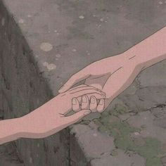 two hands reaching out to each other on the cement ground, with one hand holding another's arm