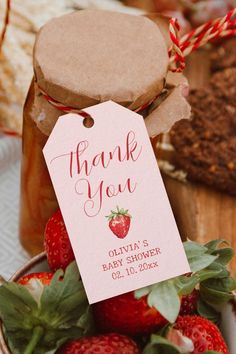 strawberries in a bowl with a thank you tag