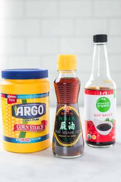 three different types of condiments on a counter