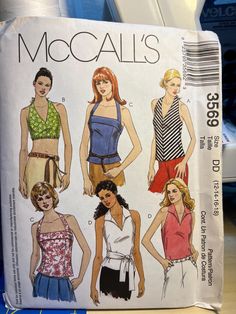 Pattern is new from 2002. Tops are halter style with an elastic back. Options include bias cut top, princess seam top, front darts and collar and sash. Multiple Sizes 12-18 Bust: 34-40" Waist: 26 1/2-32" Hips: 36-42" Halter Top Sewing, Halter Top Sewing Pattern, Ruana Pattern, Summer Halter Tops, Halter Top Pattern, Tops Pattern, 1970s Sewing Patterns, Tops For Summer, Summer Sewing