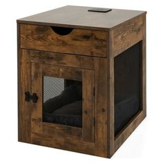 a small wooden dog house with its door open