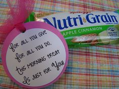 a candy bar with writing on it next to a sign that says nutrigrain