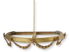 an ornate gold chandelier hanging from a chain on a white background with clippings