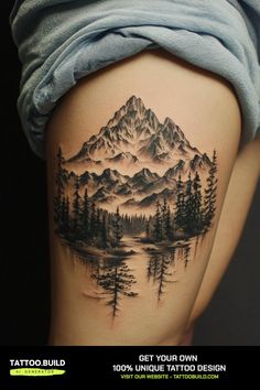 a woman's thigh with a mountain and pine trees tattoo on the side of her leg