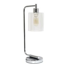 a chrome and glass table lamp on a white background