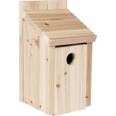 a wooden birdhouse with a hole in the side