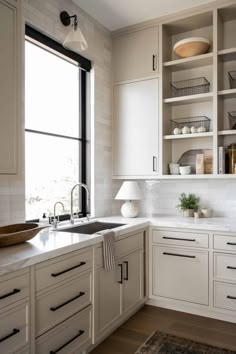 the kitchen is clean and ready for us to use in its new owner's home