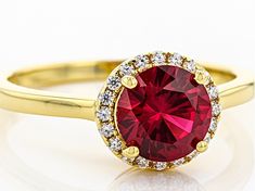 Bella Luce ® lab created ruby and white diamond simulant 1.80ctw round, Eterno™ 18k yellow gold over sterling silver ring. Measures approximately 0.75" l x 0.31" W and is not sizeable. Lab-created Ruby Diamond Ring With Prong Setting, Round Ruby Ring With Vvs Clarity Cubic Zirconia, Lab-created Ruby Diamond Ring With Accent Stones, Yellow Gold Ring With Lab-created Ruby In Halo Setting, Lab-created Ruby Ring With Halo Design, Diamond Ring With Center Stone And Lab-created Ruby, Round Diamond Ring With Center Lab-created Ruby, Lab-created Ruby Ring With Halo Setting, Lab-created Ruby Halo Ring