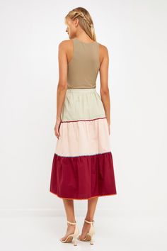 Our Color Block Midi Skirt is effortlessly stylish with a fun touch. Crafted from a lightweight colorblock fabric and complemented with a colorblock rickrack trim, this midi-length skirt features side pockets for added convenience. Perfect for casual or evening wear, our skirt is sure to stand out when you need a look that stands out! Plus, its midi-length allows the perfect balance between comfort and style. Get ready to rock this unique skirt! Colorblock fabric Colorblock rickrack trim Midi le Unique Skirt, Unique Skirts, Midi Length Skirts, Skirts For Sale, Evening Wear, Midi Length, Color Blocking, Color Block, Midi Skirt