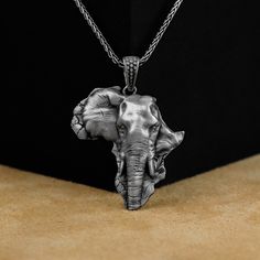 Elephant Pendant, African Elephant Silver Men Unique Necklace, Silver Elephant Necklace in the Shape of the African Continent, Birthday Gift Made of 925 silver and handcrafted by hand, this ring is not only an accessory piece that complements your daily elegance, but also has details that will reflect your character and style. It is also a great gift to give to your loved ones on their special days. At SavisSilver, we always give importance to the satisfaction of our customers, we recommend you Symbolic Silver Jewelry For Birthday Gift, Symbolic Silver Necklace For Father's Day, Symbolic Silver Necklace For Birthday, Handmade Silver Necklaces For Father's Day, 3d Pendant, African Continent, Silver Elephant, Silver Elephants, Elephant Necklace