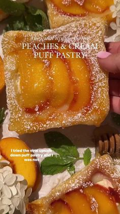 peaches and cream puff pastry on a plate with flowers, leaves and honeycombs