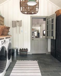 a washer and dryer in a small room