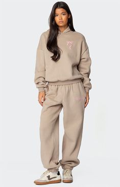 Reach your ultimate level of coziness, while still feeling on-trend with these perfect Sasha bow detail sweatpants from Edikted. Pair them with their matching sweatshirt to complete the look.SweatpantsGraphic printEdikted textMatching setCotton, PolyesterModel wears size SModel height is 5'9Item care: Machine wash at maximum 30C, do not bleach, do not tumble dry, iron at a maximum of 110C, do not dry clean. Edikted Womens Sasha Bow Detail Sweatpants - Beige size XL Sweatpants Graphic, Christian Girl Outfits, Matching Sweat Set, Sweat Suits, Refer A Friend, Fall Wardrobe Essentials, Matching Sweatshirts, Sweat Set, Denim Sweater