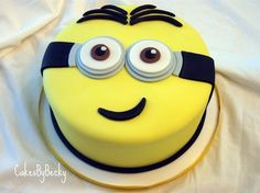 a yellow cake with eyes on it and the caption says, top despicable me cakes - i see my minioncake think i found the next cake