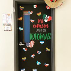 a door decorated with magnets that say, mi colasan late des nomos