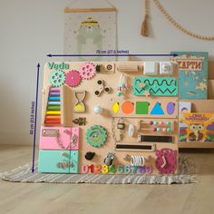 an assortment of toys and magnets on a wooden surface with measurements for each item