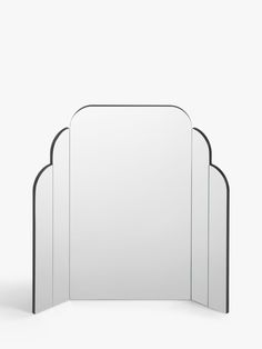 three mirrors sitting next to each other in front of a white wall with black trim