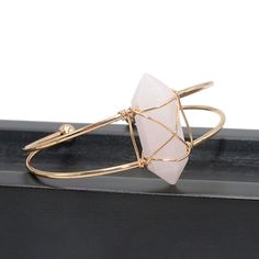 PLEASE NOTE: Our crystal stones are natural minerals and each crystal is unique. The internal ice cracks, pits, mineral points, and color differences of natural crystals are all formed naturally and are normal phenomena, which will not affect the efficacy, beauty and value of the crystal at all.Carry unconditional love everywhere with our rose quartz double layer bangle bracelet. Rose quartz, a crystal of unconditional love, carries a soft, gentle energy of compassion and peace. It is a healing Quartz Bracelet Jewelry As A Gift, Quartz Bracelet Jewelry Gift, Quartz Bracelet For Gift, Adjustable Quartz Crystal Bracelet For Spiritual Wear, Adjustable Rose Gold Crystal Bangle Bracelet, Spiritual Rose Gold Rose Quartz Bracelet, Elegant Rose Quartz Healing Bracelets, Rose Gold Heart-shaped Rose Quartz Jewelry, Layered Bangles