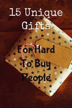 two wrapped presents on top of a wooden table with the words 15 unique gifts for hard to buy people