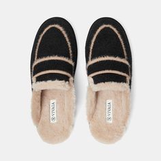 Winter Flat Slippers With Faux Fur Lining, Flat Slippers With Faux Fur Lining For Winter, Faux Fur Lined Comfy Slippers, Indoor Slippers With Faux Fur Lining And Round Toe, Comfy Slippers With Faux Fur Lining And Round Toe, Winter Indoor Slip-on Slippers, Cozy Winter Slippers With Rubber Sole, Winter Plush Lined Slip-on Slippers, Cozy Indoor Slippers With Rubber Sole