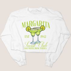 Get ready to fiesta with our Tequila Shirt Margs! Perfect for celebrating Cinco de Mayo or enjoying some margaritas with friends. This shirt will make you stand out while keeping you comfortable. It's a must-have for any tequila lover's wardrobe. Cheers to good times and great style! 6.1 oz./yd² (US), 10 oz/L yd (CA), 100% ring spun cotton, 20 singles Garment-dyed soft ring spun fabric Relaxed fit Topstitched, classic width, rib collar Twill taped neck and shoulders RETURNS& EXCHANGES: These items are NON returnable as we print on demand. Due to the custom printing, we are unable to return or exchange. If you have any questions at all before ordering, please call, live chat, or email us! We are sure you will love your items. Tequila Shirt, Margarita Cocktail, Club Shirts, Cropped Sweatshirt, Social Club, Crop Sweatshirt, Live Chat, White Sweatshirt, Twill Tape