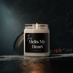 a candle with the words, this melts my heart on it