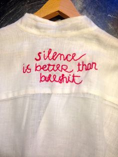 a white shirt with red writing on it that says, science is better than breast