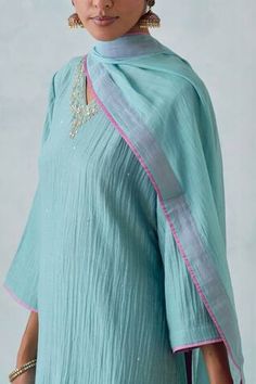 Teal blue chanderi kurta with sequin and thread embroidery. Paired with a cotton pant and chanderi dupatta. - Aza Fashions Blue Cotton Silk Salwar Kameez With Mirror Work, Blue Straight Kurta With Mirror Work, Blue Cotton Silk Churidar With Dabka Work, Blue Cotton Traditional Wear With Mirror Work, Blue Cotton Kurta With Gota Work, Blue Mulmul Palazzo Set With Dabka Work, Blue Cotton Salwar Kameez With Gota Work, Blue Straight Kurta Churidar With Gota Work, Blue Cotton Kurta With Mirror Work