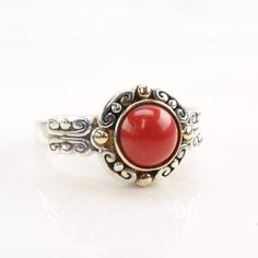 This ring is a size  (USA); It may be resized. Markings: 925, 585 (14K), China, HVE (Tested & guaranteed to be  Silver) This ring weighs 6.4 Grams The Stone/Design is Red Faux Coral 14k Gold Beads   Man-made coral  The Stone/Design measures 7.8 x 7.8 mm The condition of this ring is Estate, Very good, no stone wear, light patina  This vintage item is circa pre-2004  To have us do the resize, add this listing and the resize listing to your cart and select which size you would like this ring to be on the resize listing which may be accessed through this link: https://www.etsy.com/listing/780307949/simple-silver-ring-resize Stock# R4152Aly For more vintage sterling silver rings please visit:  https://www.etsy.com/shop/SilverStarrs925?section_id=13854217 Thank you for viewing my item!  Favorit Classic Adjustable Red Ring, Classic Rings With Stone Setting, Vintage Red Jewelry With Bezel Setting, Elegant Adjustable Ring With Stone Setting, Red Adjustable Classic Jewelry, Adjustable Round Ruby Ring In Fine Jewelry Style, Elegant Red Stackable Jewelry, Classic Sterling Silver Cabochon Ruby Ring, Classic Sterling Silver Ruby Ring With Cabochon