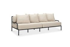 an outdoor sofa with four pillows on it's back and three sides, in black metal