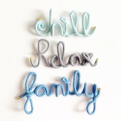 three crochet letters that spell out the word family