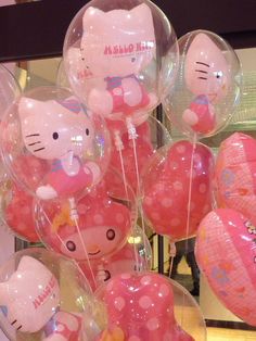 many hello kitty balloons are in the shape of animals