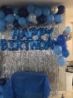 a birthday party with balloons and streamers