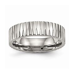 a men's wedding band in white gold with wavy lines on the outside of it