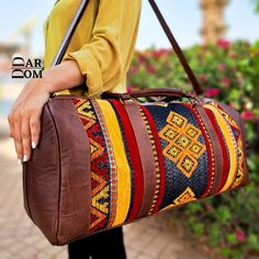 ## Product Characteristics ## -Material: Full-grain leather 100% natural and berber fabric -100% Handmade -Color : Dark Brown - Dimension : -------------------Small: [L(15")* H(7") * W (8")] [38 cm L* 20 cm H * 20 cm W ] ---------------- Medium: [L(18")* H(9") * W (8.20")] [45 cm L* 23 cm H * 21 cm W ] ----------------- Large: L(21.6")x H(11")x W(10") [L(55)cm x H(28)cm x W(27)cm] Discover the perfect companion for your adventures with our handmade leather and Berber fabric travel sport duffel b Moroccan Leather, Carpet Bag, Leather Travel Bag, Vintage Leather Bag, Men Gifts, Travel Duffel, Duffel Bags, Duffel Bag Travel, Valentines Day Gifts For Her