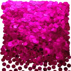 pink sequins are scattered on top of each other in the shape of a square