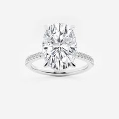 a round cut diamond ring with pave set shoulders