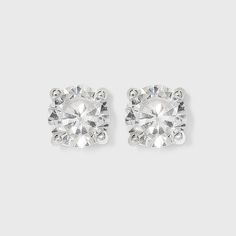 Whether you're running to yoga or heading to a formal party, complete your look with this Women's Sterling Silver Cubic Zirconia Stud Earrings from A New Day™ in Silver/Clear. Showcasing round-cut, clear cubic zirconia stones held secure in a four-prong setting, these brilliant earrings are both simple and elegant to wear. Gender: female. Age Group: adult. Pattern: Solid. Hoop Earring Sets, Expensive Jewelry, Cubic Zirconia Earrings, Beaded Hoop Earrings, Beaded Hoops, Formal Party, Fringe Earrings, Real Diamonds, Earring Backs