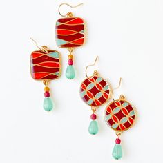 "Beautiful 24K Gold Plated Mid Century retro style earrings with tiny turquoise glass drop beads. Choose one of the two styles. The earrings measure 1.5\" long with 24K gold plated ear wires. Nickel and lead-free. The Details: 1.5\" long 24K gold plated enamel and epoxy shipped in a gift box" Bohemian Colorful Earrings For Gift, Turquoise Enamel Dangle Earrings, Bold Jewelry With Matching Dangle Earrings, Retro Multicolor Drop Earrings, Bohemian Multicolor Enamel Earrings, Retro Multicolor Metal Earrings, Bold Handmade Gold Earrings, Multicolor Czech Glass Drop Earrings, Colorful Dangle Earrings For Gift