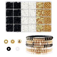 gold, black and white beaded bracelets are arranged in an organized plastic case