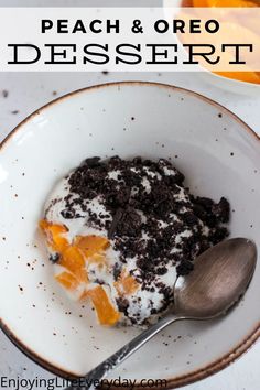 an oreo peach easy trifle in a bowl with a spoon on the side