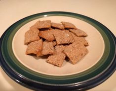 a plate full of crackers sitting on a table