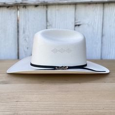 Price INCLUDES taxes and SHIPPING anywhere in the United States!
Known for its versatility and popularity, the 50X Fantasma cowboy hat from Rocha Hats comes in a featherless version, maintaining its classic appeal. With a 3 1/4" brim and a 4 1/2" crown, this Mexican-made hat is ideal for fans of the cowboy style who prefer a simpler, but equally elegant design.
Description of the Hat:
Style: 50X Fantasma
Brand: Rocha Hats
Brim: 3 1/4"
Crown: 4 1/2"
Made in Mexico
To protect your hat: Dust your h White Western Panama Hat With Curved Brim, White Panama Hat With Short Brim For Rodeo, White Western Panama Hat With Short Brim, White Short Brim Panama Hat For Rodeo, White Western Fedora Panama Hat, Western White Panama Hat For Kentucky Derby, White Brimmed Panama Hat For Rodeo, White Western Style Panama Hat, White Western Straw Hat With Short Brim