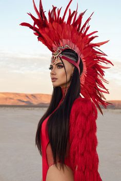 Unleash your inner festival spirit with this stunning Handmade Red Feather Headpiece  , perfect for Burning Man and other festivals. This eye-catching ensemble features an intricately designed tribal headdress adorned with vibrant red feathers and dazzling jewels, ensuring you stand out in any crowd.  Features: *Unique Design: The extravagant red feather headpiece is handcrafted with precision, showcasing vibrant feathers and sparkling embellishments that add a touch of tribal elegance. *Comfort and Fit: elastic band stretchy and one size fits all, for costume head size text us . *Versatile Wear: Ideal for festivals like Burning Man, Coachella, and other themed events, this outfit is perfect for making a bold statement. *Handmade with Love: Each piece is carefully handcrafted, ensuring you Rave Costume, Festival Headpiece, Festival Costume, Look Festival, Rave Costumes, Feather Headpiece, Burning Man Outfits, Burning Man Festival, Festival Costumes