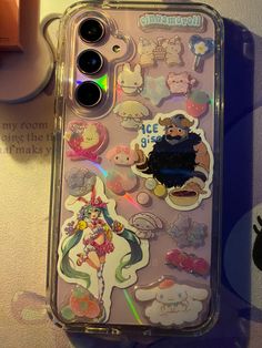 an iphone case with many stickers on it